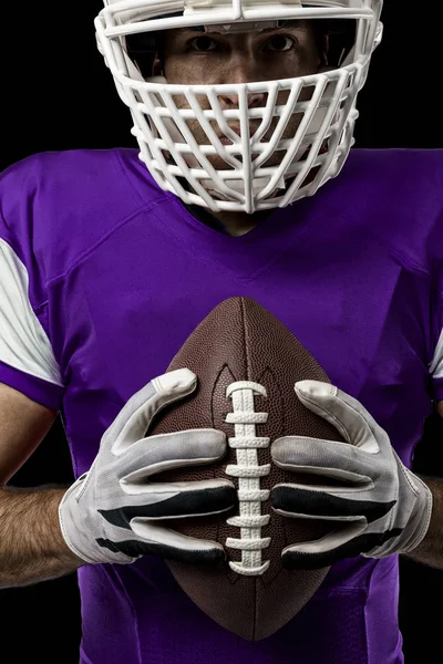 Football Player with a purple uniform — Stock Photo, Image