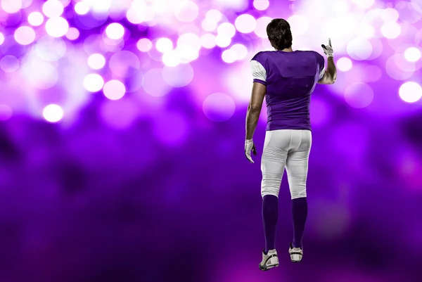 Football Player with a purple uniform