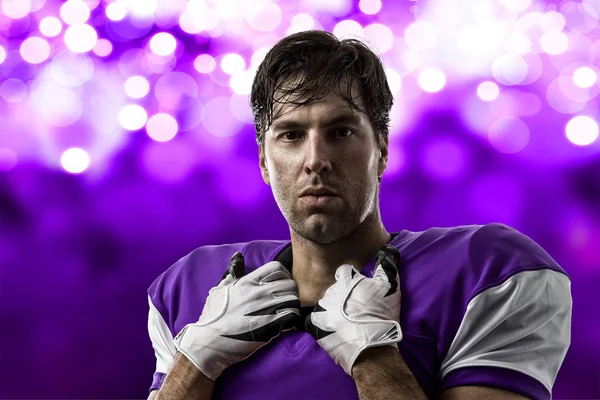 Football Player with a purple uniform