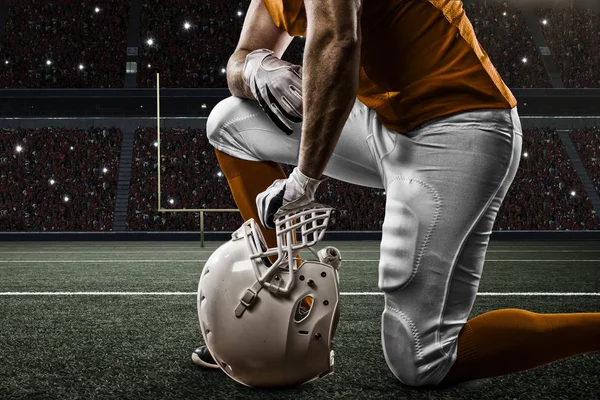 Voetballer met een oranje uniform — Stockfoto