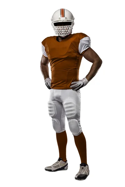 Jogador de futebol com um uniforme laranja — Fotografia de Stock