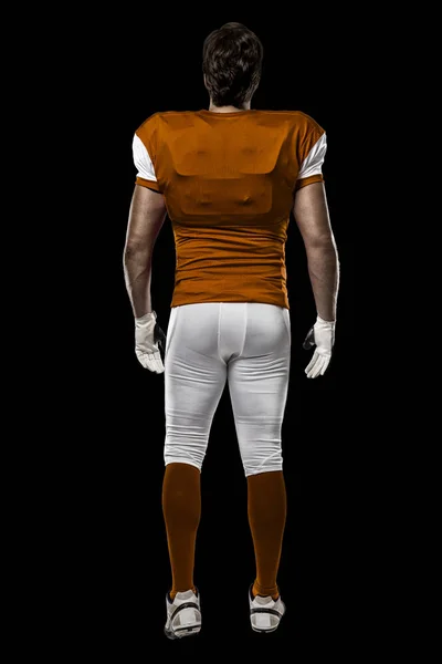 Fotbalista s oranžové uniformě — Stock fotografie