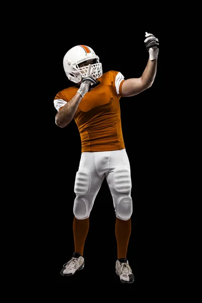 Football Player with a orange uniform — Stock Photo, Image