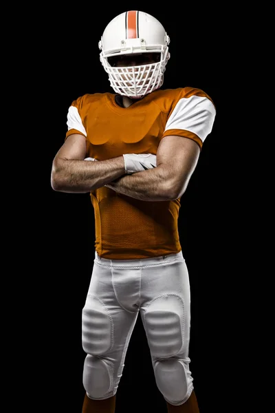 Voetballer met een oranje uniform — Stockfoto