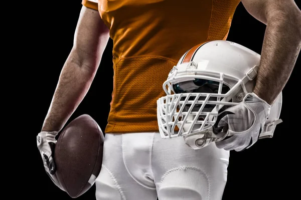 Jogador de futebol com um uniforme laranja — Fotografia de Stock