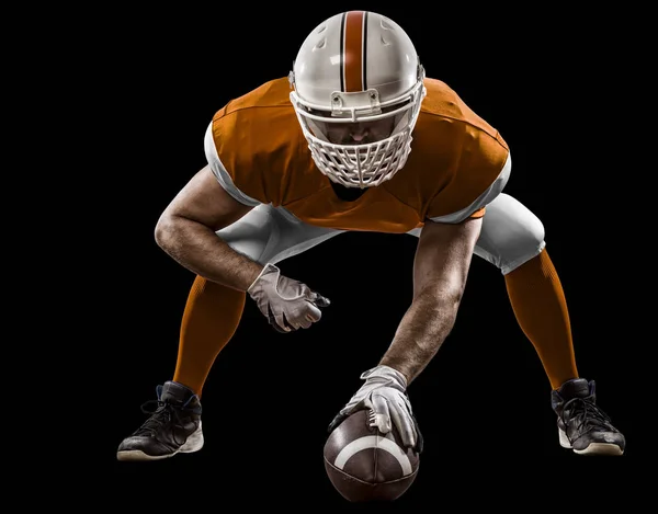 Jogador de futebol com um uniforme laranja — Fotografia de Stock