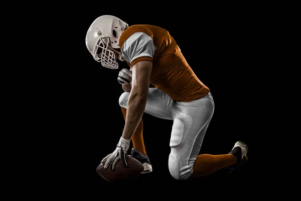 Voetballer met een oranje uniform — Stockfoto