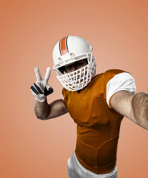 Football Player with a orange uniform