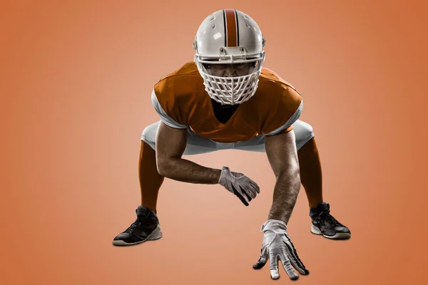 Joueur de football avec un uniforme orange — Photo