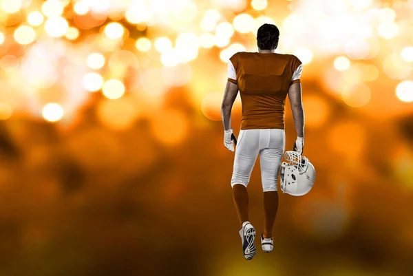 Football Player with a orange uniform