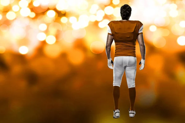 Football Player with a orange uniform