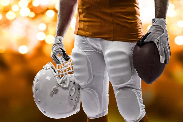 Football Player with a orange uniform — Stock Photo, Image