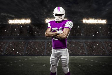 Futbolcu pembe üniforma ile