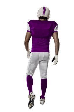 Futbolcu pembe üniforma ile