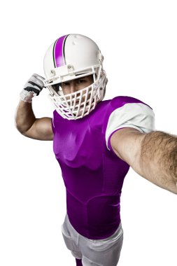 Futbolcu pembe üniforma ile