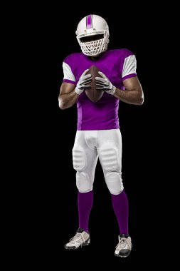 Futbolcu pembe üniforma ile