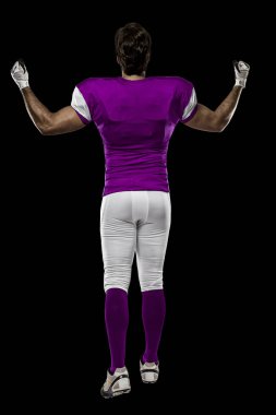 Futbolcu pembe üniforma ile