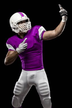 Futbolcu pembe üniforma ile