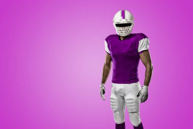 Futbolcu pembe üniforma ile