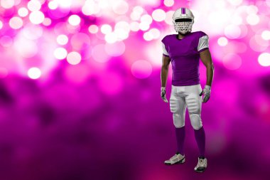 Futbolcu pembe üniforma ile