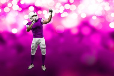 Futbolcu pembe üniforma ile