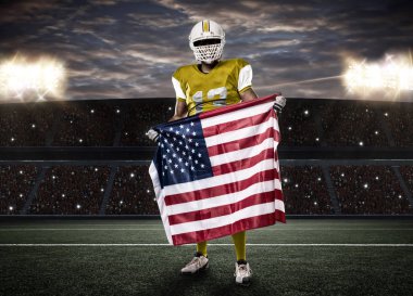 Futbolcu sarı üniforma ile