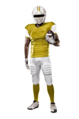 Futbolcu sarı üniforma ile