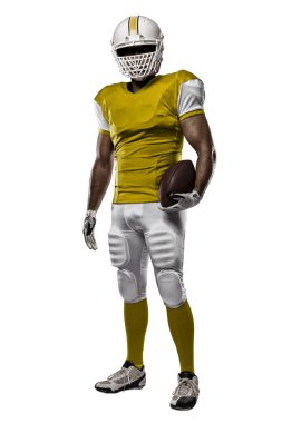 Futbolcu sarı üniforma ile