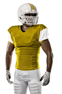 Futbolcu sarı üniforma ile