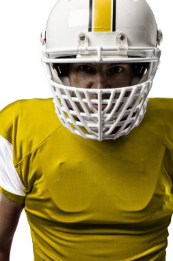 Futbolcu sarı üniforma ile