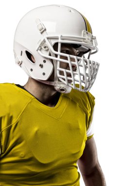 Futbolcu sarı üniforma ile