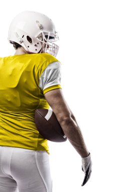 Futbolcu sarı üniforma ile