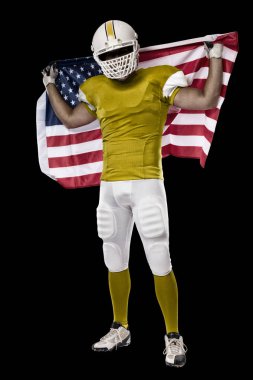 Futbolcu sarı üniforma ile