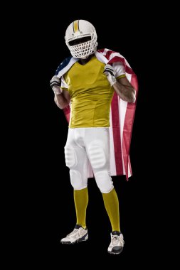 Futbolcu sarı üniforma ile