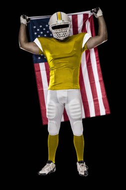 Futbolcu sarı üniforma ile