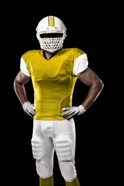 Futbolcu sarı üniforma ile