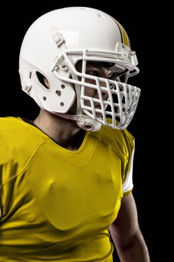 Futbolcu sarı üniforma ile