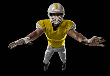 Futbolcu sarı üniforma ile