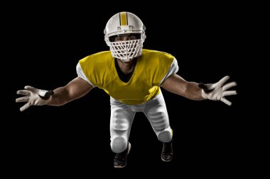 Futbolcu sarı üniforma ile