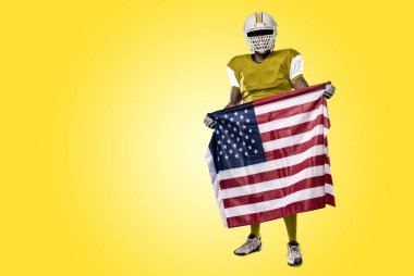 Futbolcu sarı üniforma ile