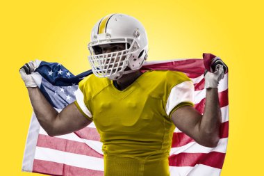 Futbolcu sarı üniforma ile