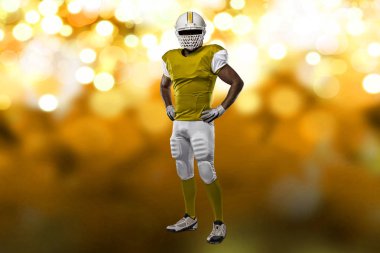 Futbolcu sarı üniforma ile