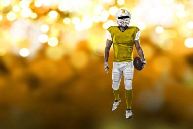 Futbolcu sarı üniforma ile