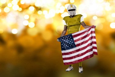 Futbolcu sarı üniforma ile