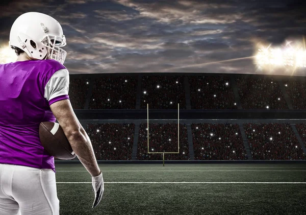 Football Player with a pink uniform — Stock Photo, Image