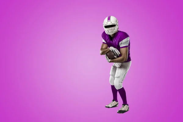 Football Player with a pink uniform — Stock Photo, Image