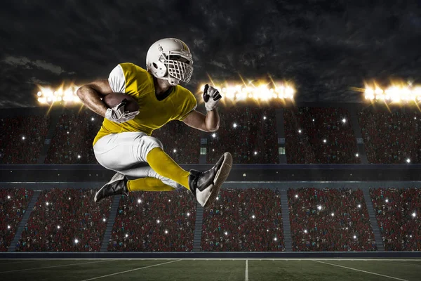 Football Player with a yellow uniform — Stock Photo, Image