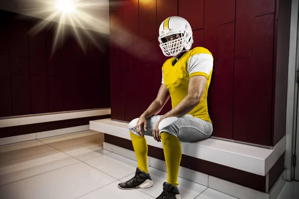 Football Player with a yellow uniform