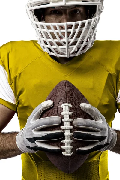 Futbolcu sarı üniforma ile