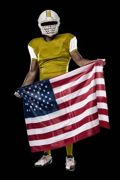 Futbolcu sarı üniforma ile